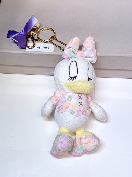 Disney Daisy sleeping in flower dress plush keychain, preowned in good condition available on hand